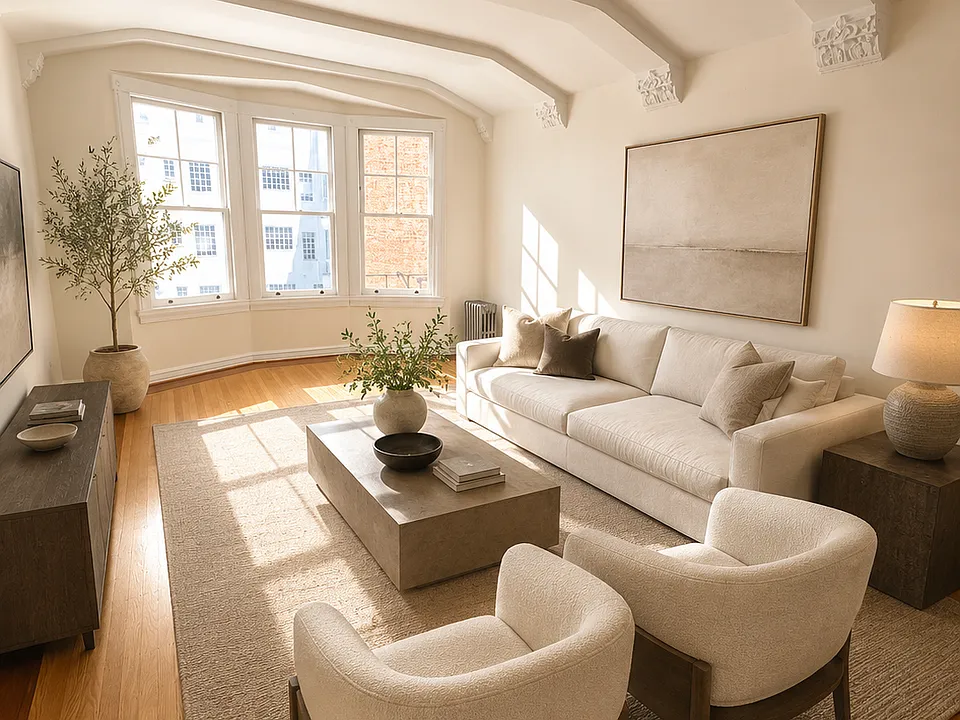 Unit #601 incredible living room with stunning architectural beamed ceiling and bay windows!