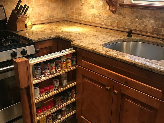 Hidden pocket spice rack 