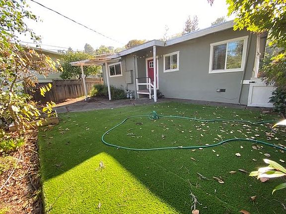 Waterless front yard with new fence and more garden areas out of photo. owner pays water