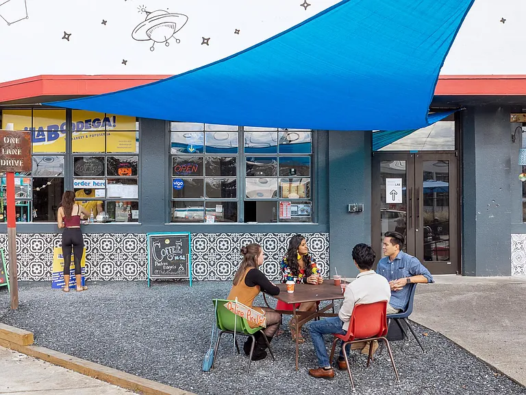 Neighborhood Amenity- La Bodega coffee, dining and groceries

(Photo credit- W. Scott Chester provided by Carter)