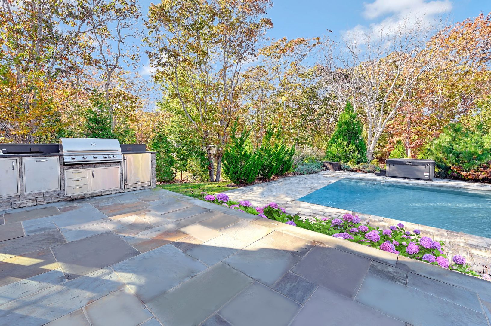  Outdoor kitchen on stone patio