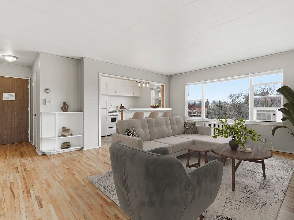 Unwind in the spacious living area of Central Lakes of Uptown, where contemporary design meets comfort. Enjoy natural light pouring in through large windows, creating a warm and inviting atmosphere perfect for relaxation. Schedule your tour today!