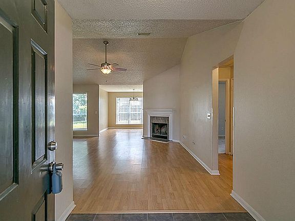 Opens to the living room; utility room is on the left as well.