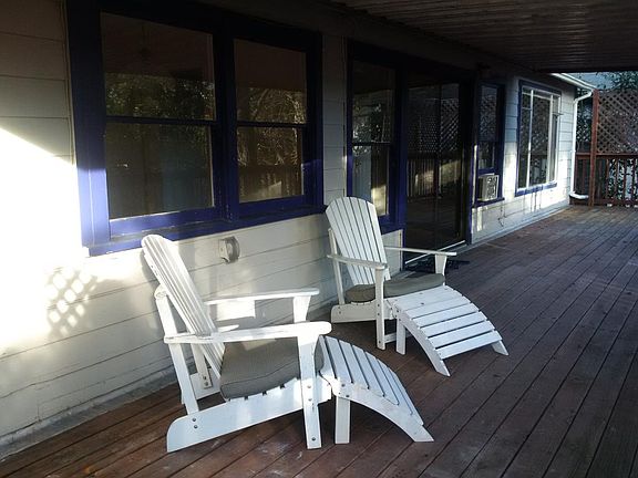 Adirondak chairs in front of dining room kitchen