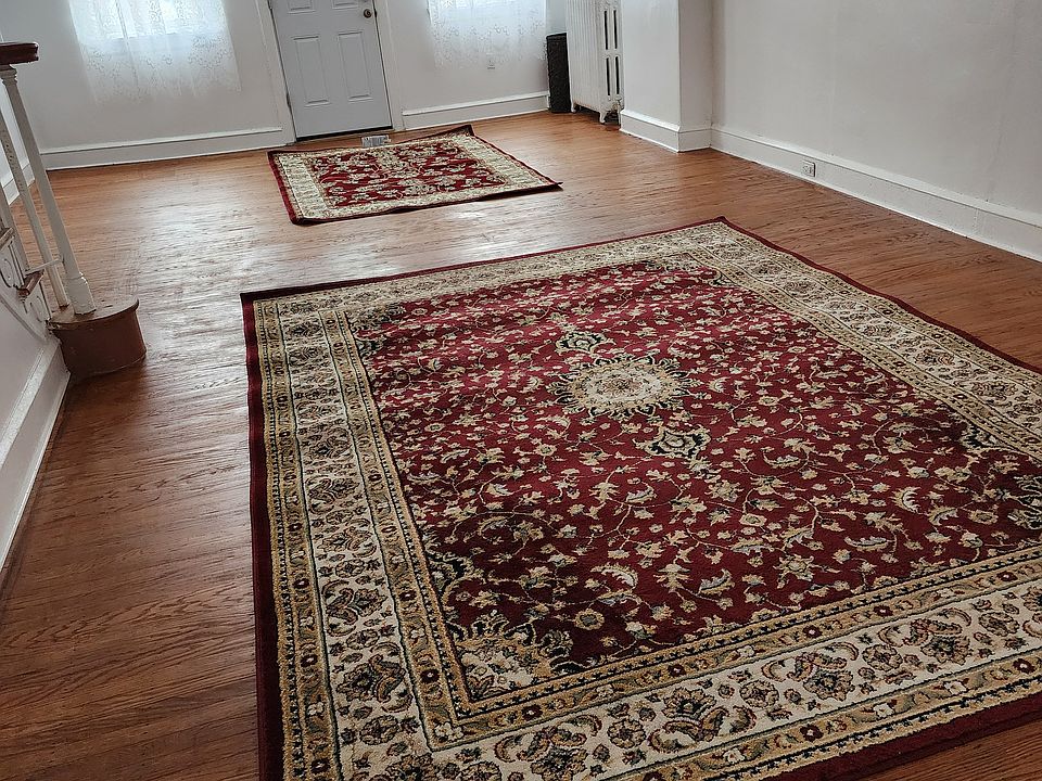spacious, elegant living room and dining room