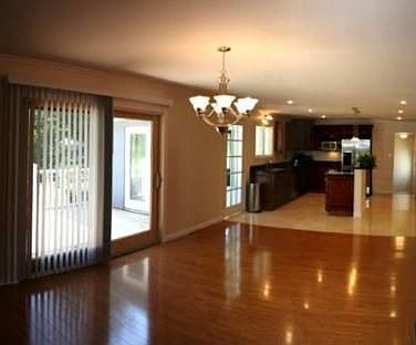 Spacious Dining w/premium flooring, crown molding,& slider to new cedar deck