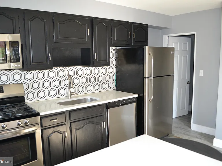7448 Durwood Rd — Photo 3