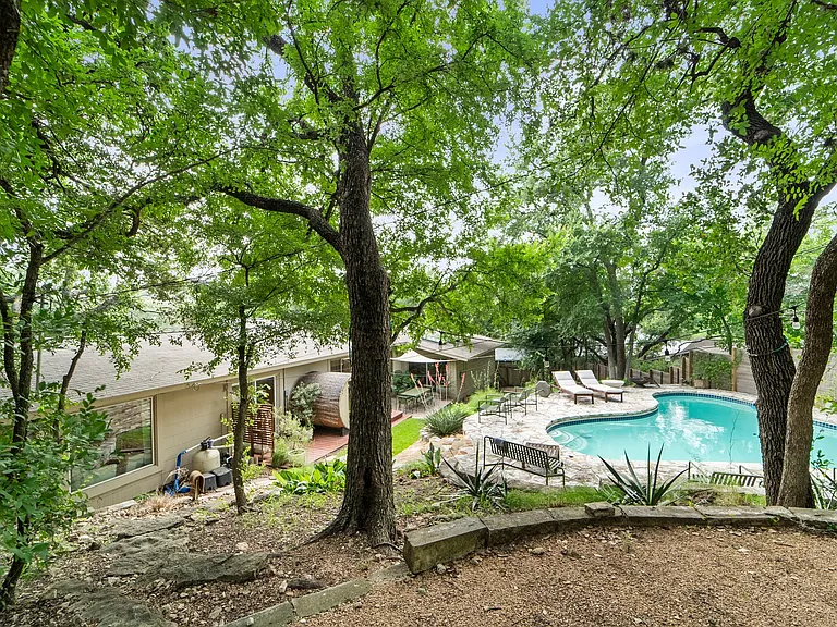 Terraced back yard. Looking from highest point. Area in foreground can be for lawn furniture. Yard completely enclosed