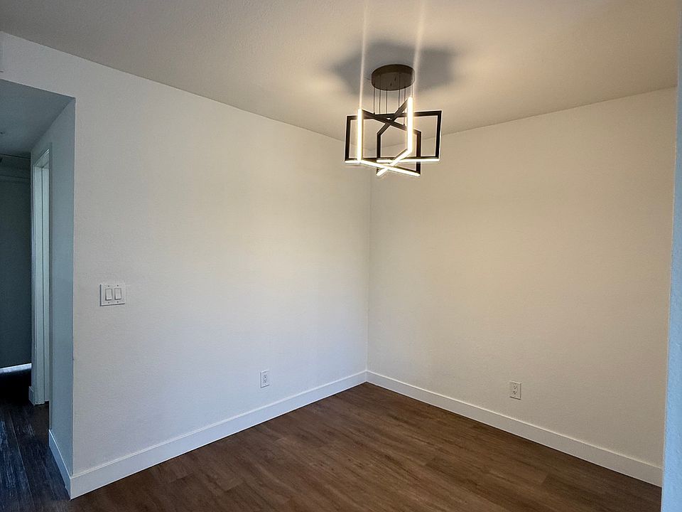 Dining area with a ceiling metal light fixture