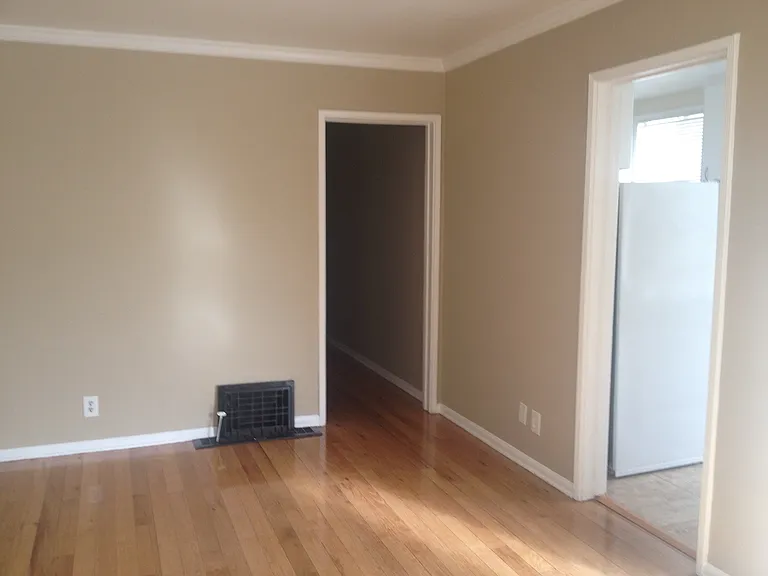 Living Room facing hallway to bedroom and bathroom