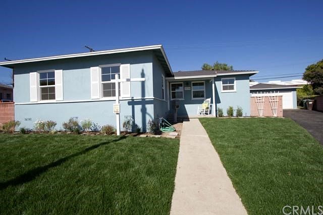 Front Yard View (Located at end of Culdesac) with long driveway leading to detached garage
