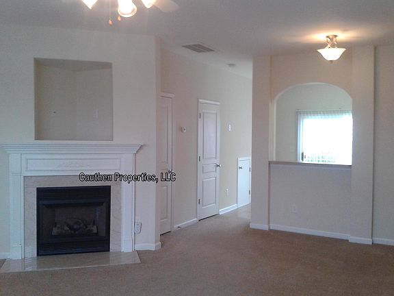 This room no longer has carpet. Wood vinyl.