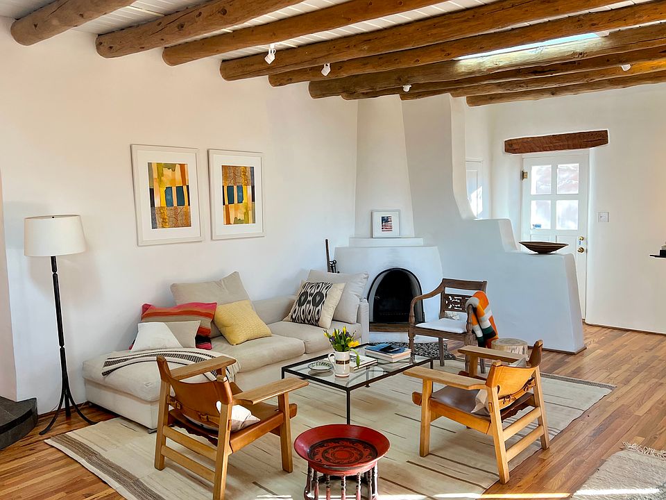 Living room with beams and skylights