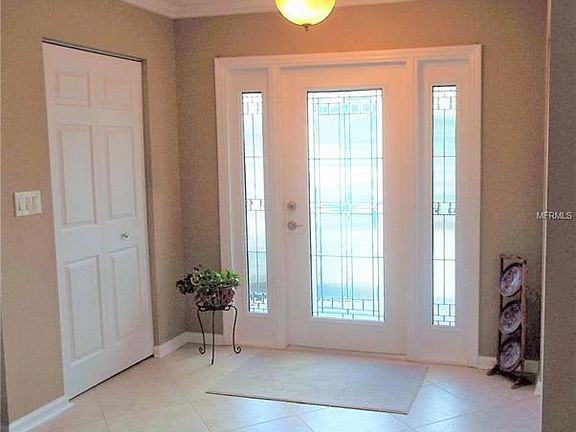 leaded front door and coat closet in your tile entry