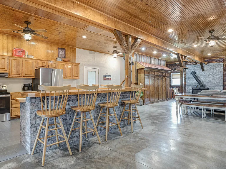 Very large kitchen with wrap around bar. Seating for up to 9 people.