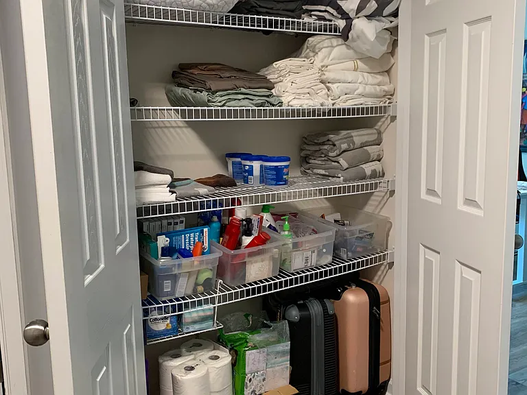 Large linen closet in hallway.