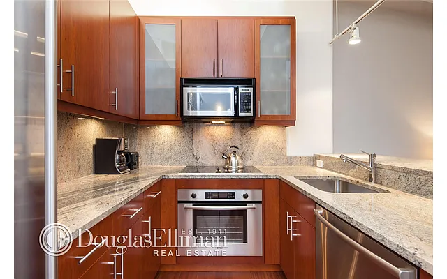 Sold by Douglas Elliman | media 13