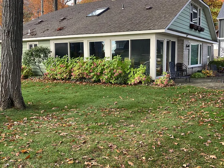 East side of home and side lot.