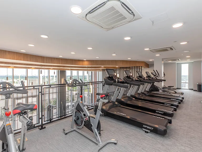 24 Hour Fitness Center with Cardio & Weight Training Equipment