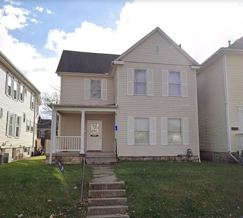 Front of house with porch, looking south