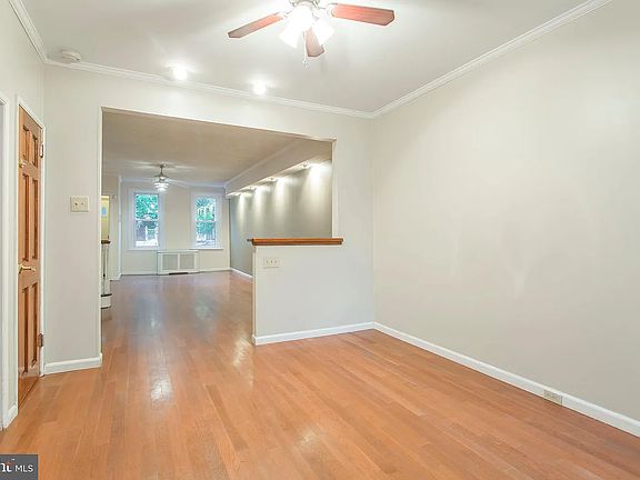 Open dining room leads into the newly renovated kitchen