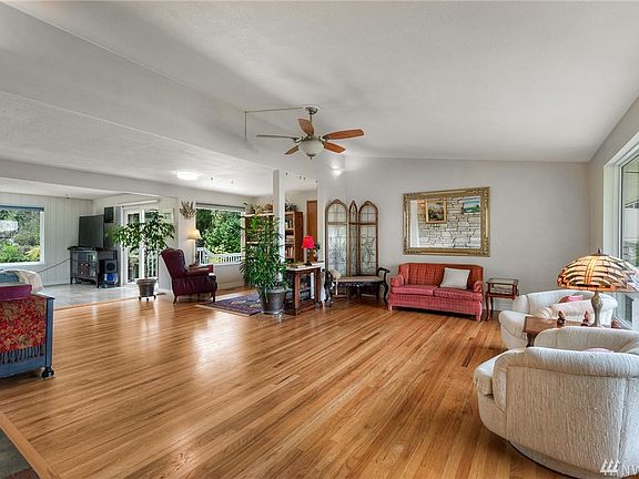 Gleaming hardwoods in the light and bright living room