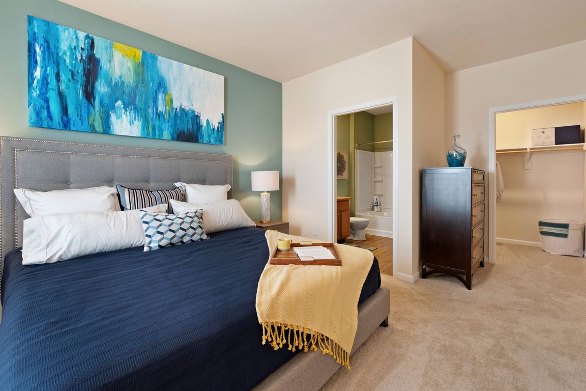 Bedroom View with Large Closet and En Suite Bathroom