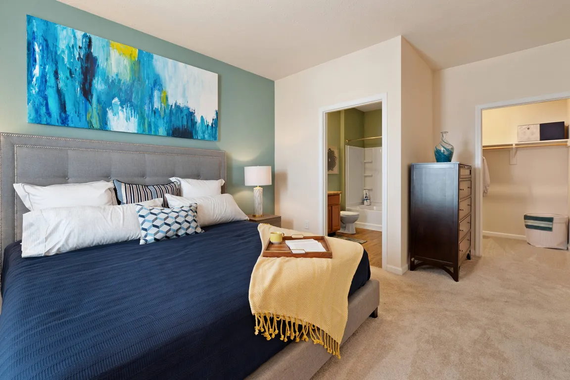 Bedroom View with Large Closet and En Suite Bathroom