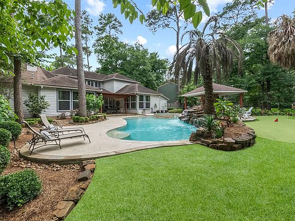 Backyard oasis with your own putting green