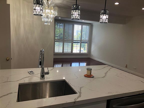 Newly renovated Kitchen overlooking Living room