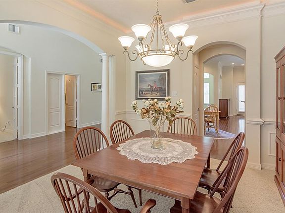 Formal dining room looking into entry way