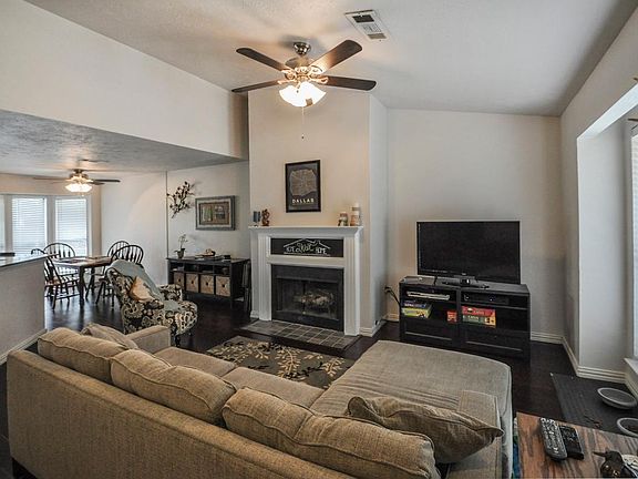 Living room with WBFP & vaulted ceilings