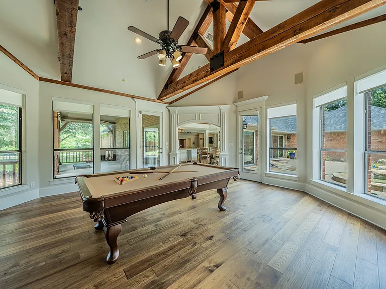 Sun-Drenched Billiards Lounge with Wrap-Around Pool & Garden Views