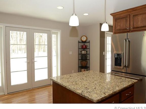 Double doors open to the pa...