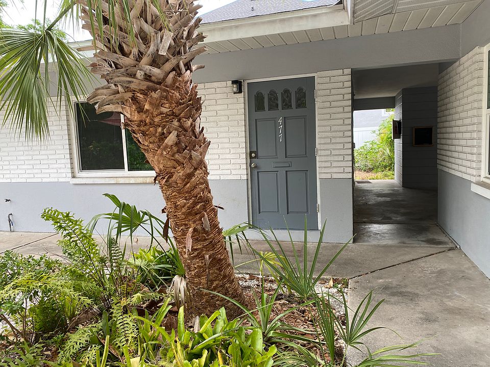 Front door, breezeway to the right