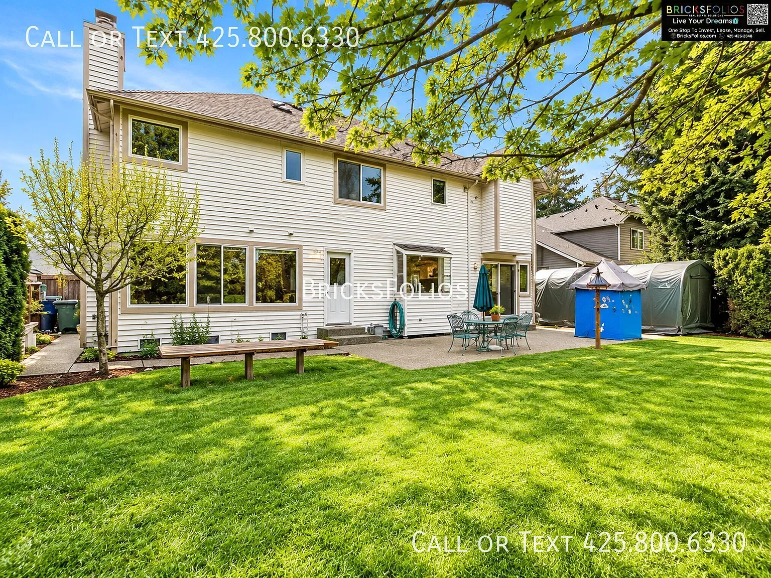 Spacious 4 Bed Renton Home with Central A/C, Fenced Yard & 2-Car Garage — Photo 2
