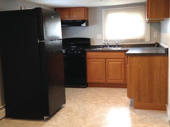 Kitchen, new refrigerator, range and flooring