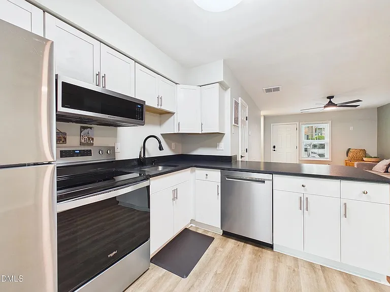 Kitchen with stainless steel appliances.