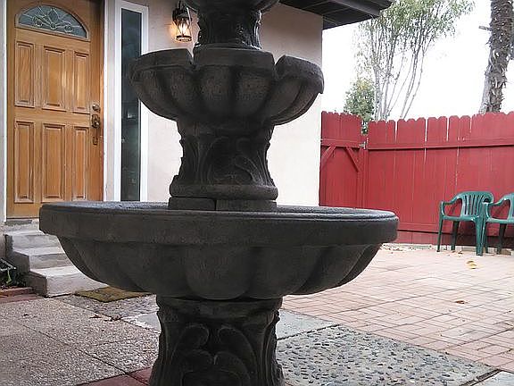 front yard with fountain