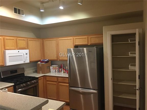 Notice large pantry and recessed ceiling/lights