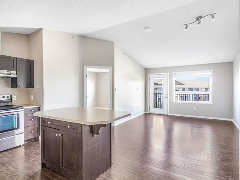 9357 Simpson Dr NW #2401 — Photo 1