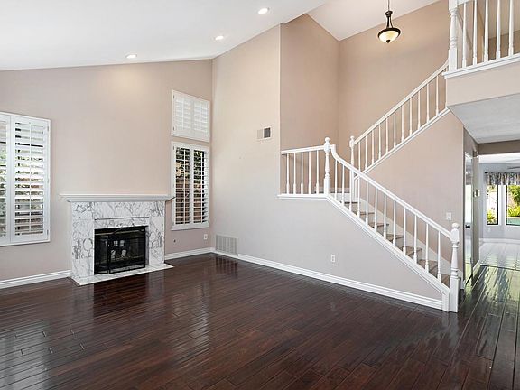 Family room with Plantation Shutters and Fireplace