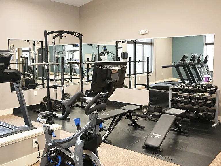Free weights in luxury gym at The Sterling Kearney.