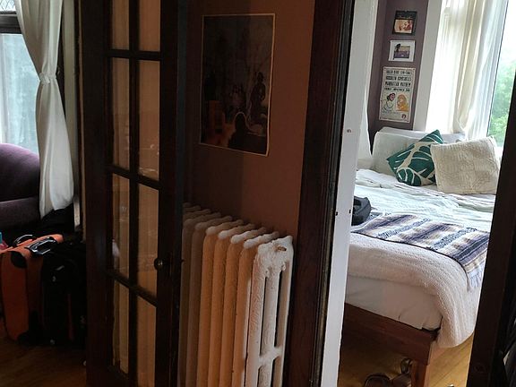 Little room off of living room leading into sunroom