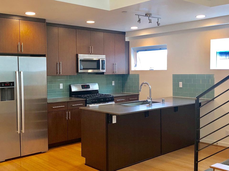 Kitchen on the main level. Stainless steel appliances.