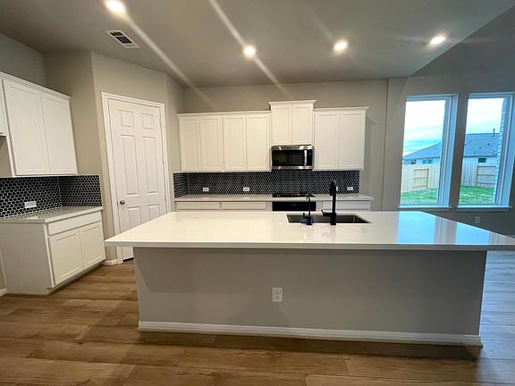 Construction progress - kitchen with center island and walk-in pantry