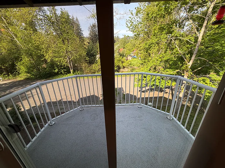 large patio with sliding glass doors
