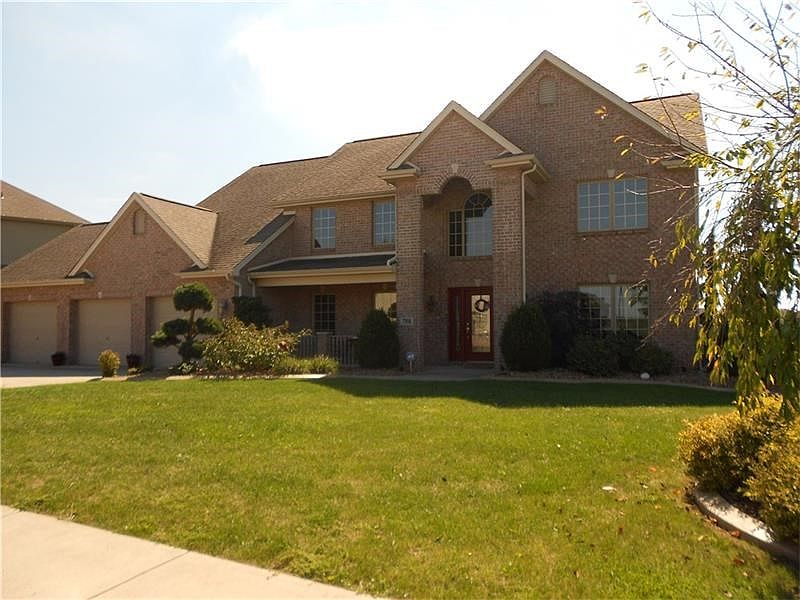 EXTERIOR FRONT WITH LARGE PORCH