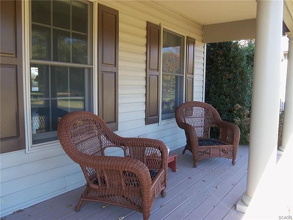 Come and sit a spell on welcoming front porch.
