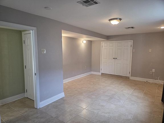 Bedroom #1 with view of walk-in closet
